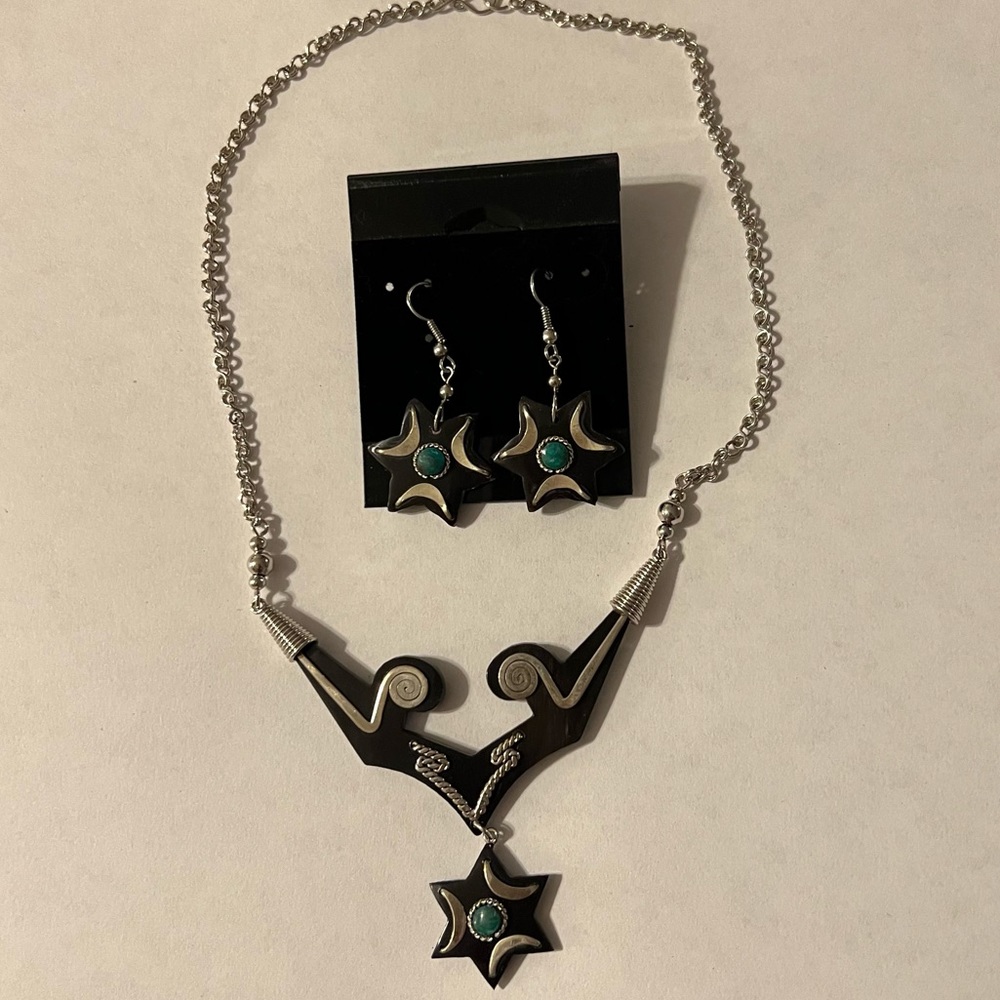 Black/green acrylic and metal earring and necklace set.